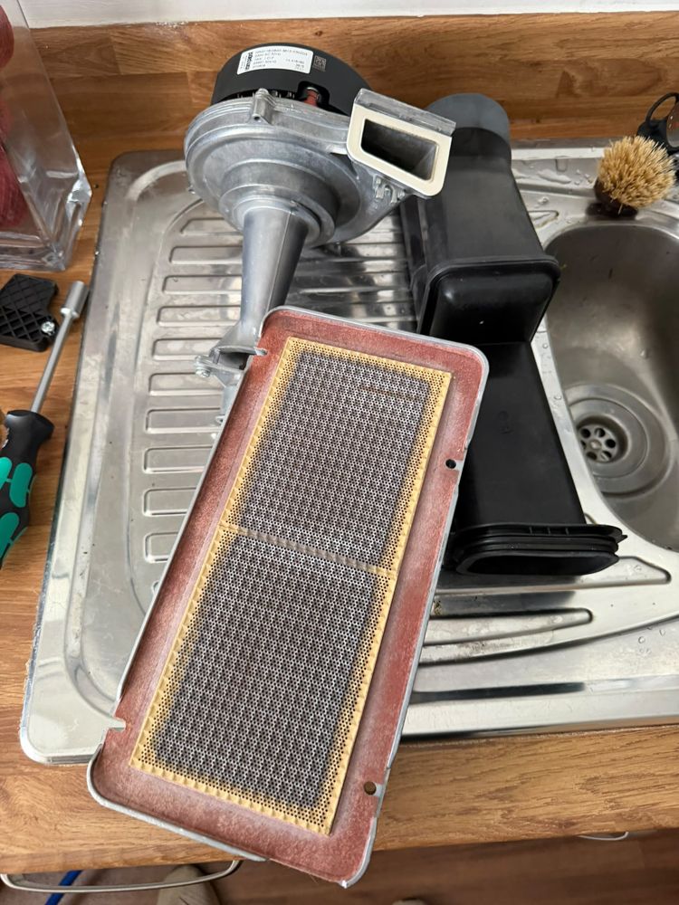 Boiler fan and burner removed for cleaning